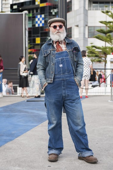 Street Style - VAMFF Docklands Saturday 22nd March 2014. National Graduate Showcase Runway.  Pic shows: RMIT fashion designer teacher Dr Peter Allan in Japanese demin label 'Big John overalls & Levis jacket.